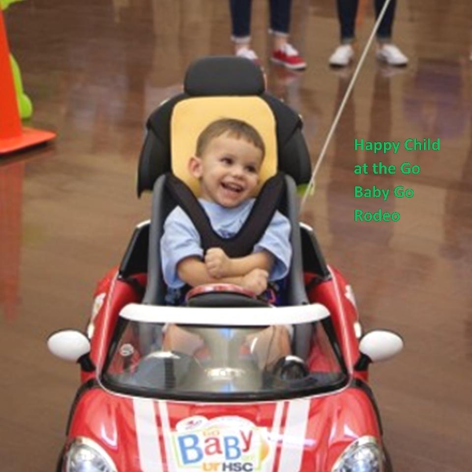 Happy child in a electric car