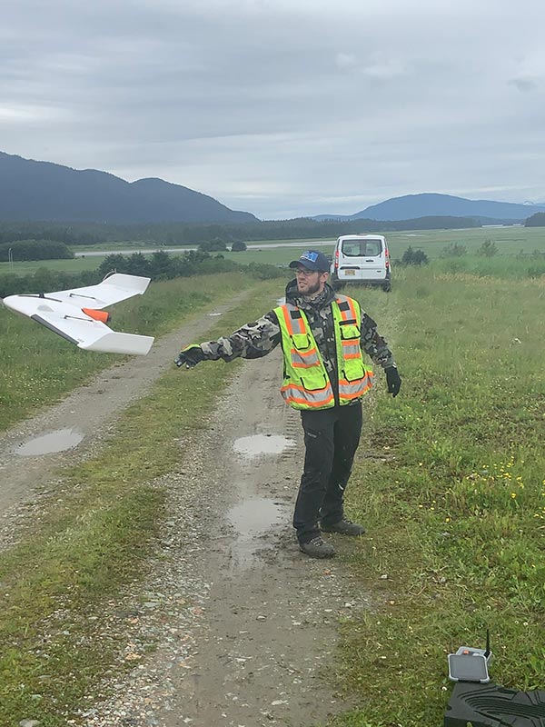 John P. Brady working in the field