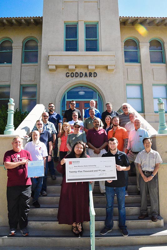 NM State University students holding check from NCEES